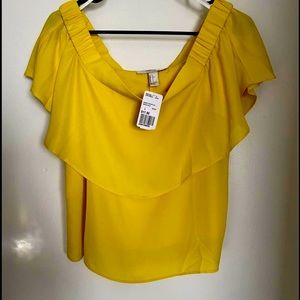 Of the shoulder shirt